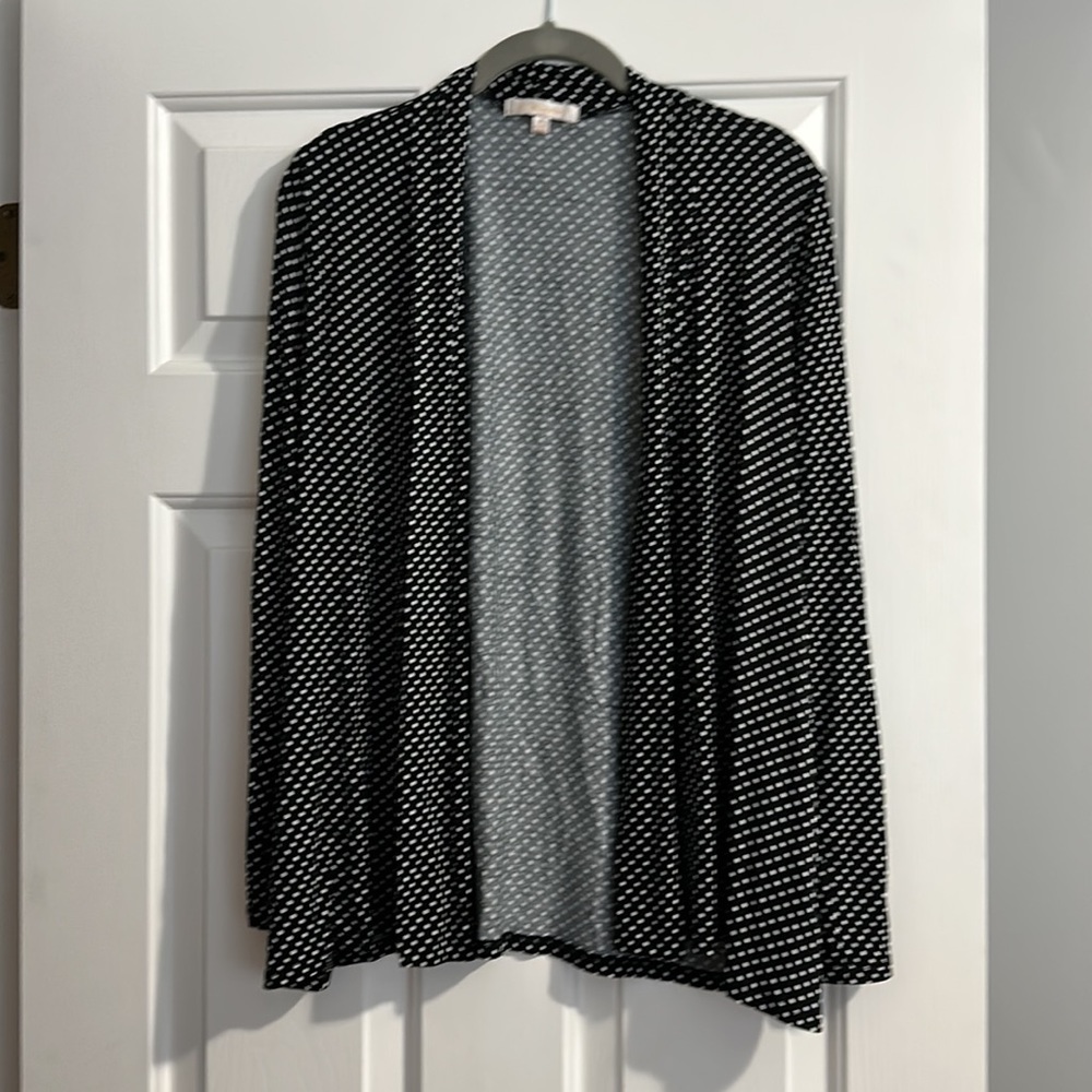Cute stretchy black and white polka dot jacket.  Size M. G Collection.